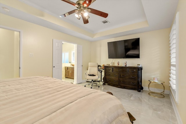 7411 Shady Arbour Ct, Pasadena, TX 77505 - bedroom featuring ornamental molding, light marble finish flooring, a tray ceiling, ensuite bathroom, and ceiling fan