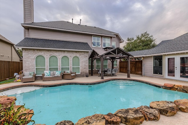 view of swimming pool with a gazebo, an outdoor hangout area, and a patio