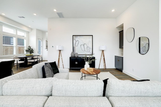 living room with dark wood-type flooring