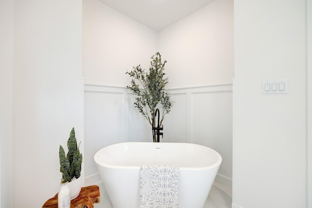 bathroom featuring a washtub