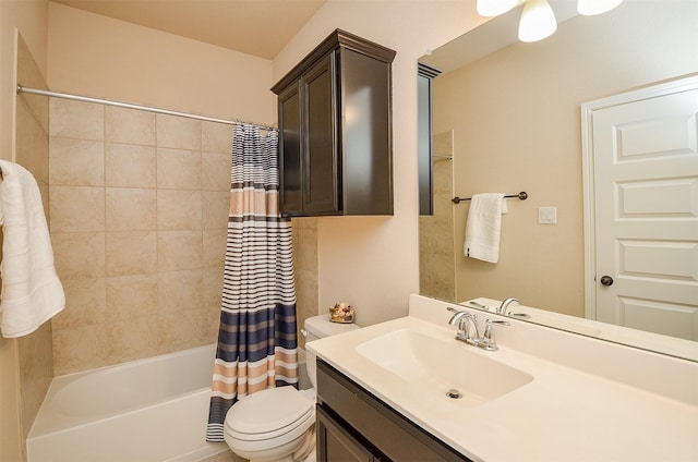 full bathroom featuring vanity, toilet, and shower / tub combo