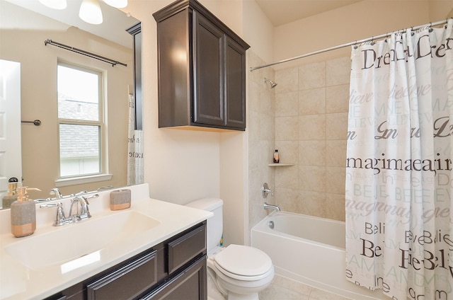 full bathroom with tile patterned flooring, vanity, toilet, and shower / tub combo