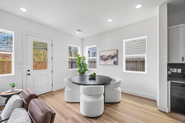 dining room featuring light hardwood / wood-style flooring