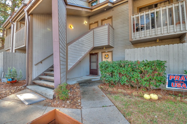 3900 Aspen Unit 204B, Montgomery, TX 77356 - view of exterior entry with a balcony