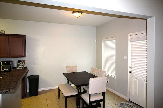 view of tiled dining area