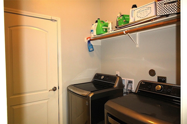 laundry room featuring independent washer and dryer