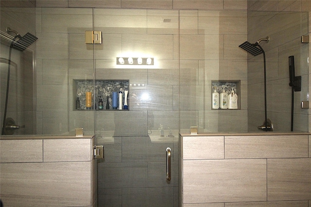 bathroom with an enclosed shower