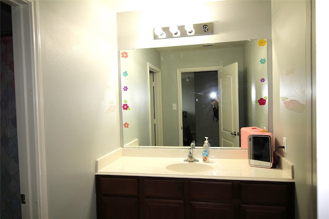 bathroom featuring vanity