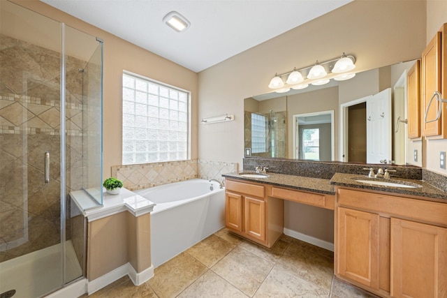 bathroom with shower with separate bathtub and vanity