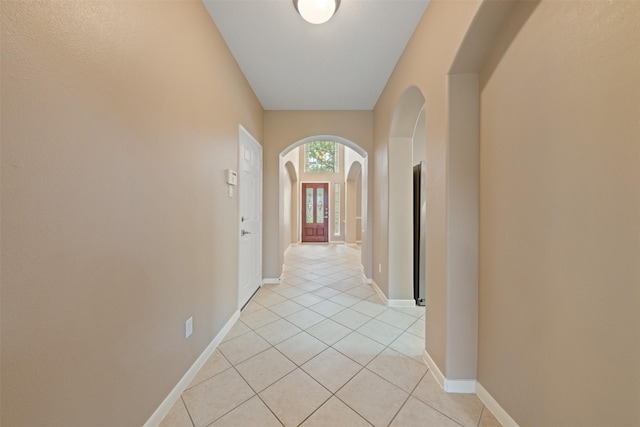 hallway with light tile patterned flooring