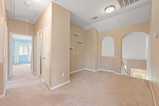 interior space featuring light colored carpet