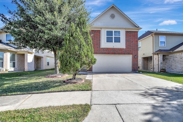 view of front of home with a garage and a front yard