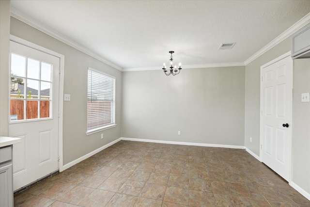 unfurnished dining area with ornamental molding and a notable chandelier