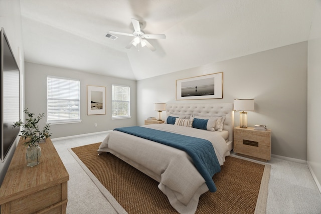 bedroom with light carpet, ceiling fan, and lofted ceiling