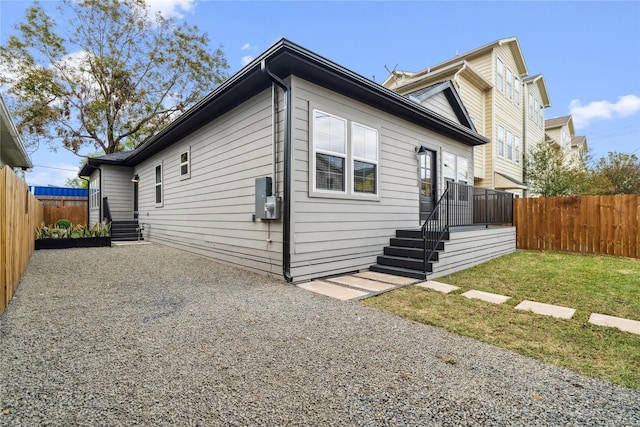 exterior space featuring a front yard