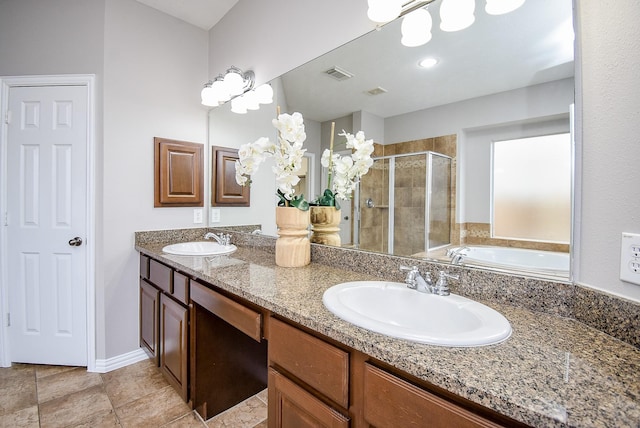 bathroom featuring vanity and an enclosed shower