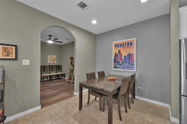 dining area featuring ceiling fan and light hardwood / wood-style floors