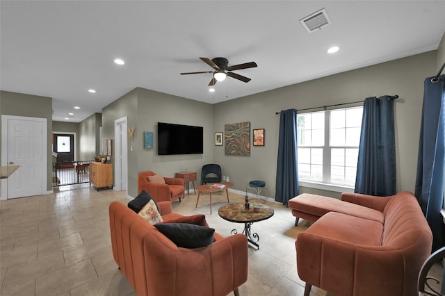 living room featuring ceiling fan