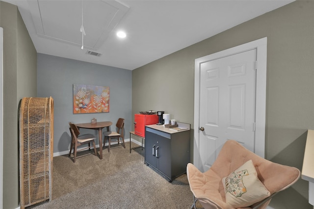 sitting room with light colored carpet