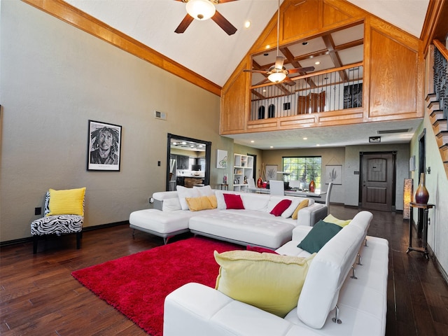 living room featuring ceiling fan, beam ceiling, dark hardwood / wood-style flooring, and high vaulted ceiling