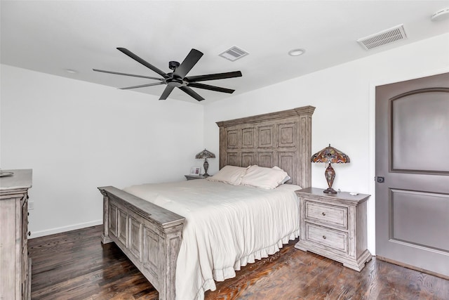 bedroom featuring ceiling fan and dark hardwood / wood-style flooring