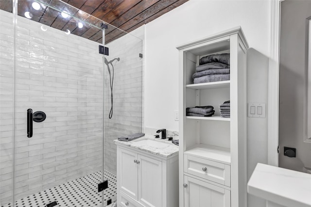 bathroom featuring vanity, wooden ceiling, and an enclosed shower