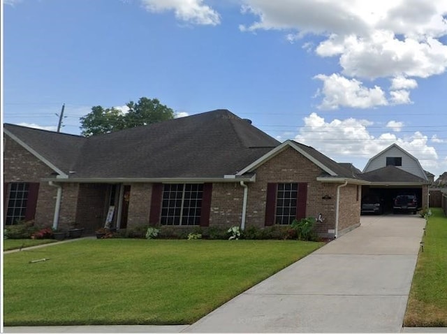 single story home with a carport and a front lawn