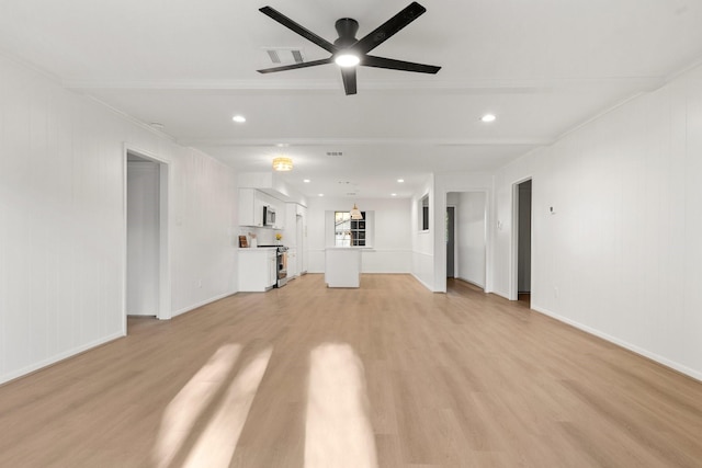 unfurnished living room featuring ceiling fan, light hardwood / wood-style flooring, and ornamental molding