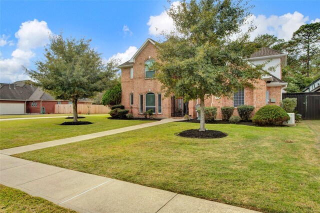 view of front of property with a front lawn