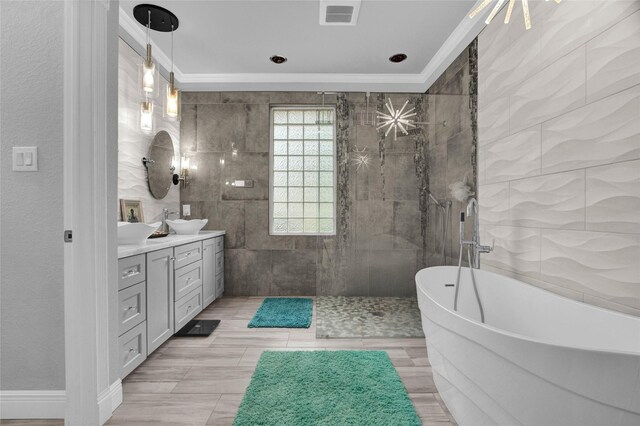 bathroom featuring vanity, crown molding, and plus walk in shower