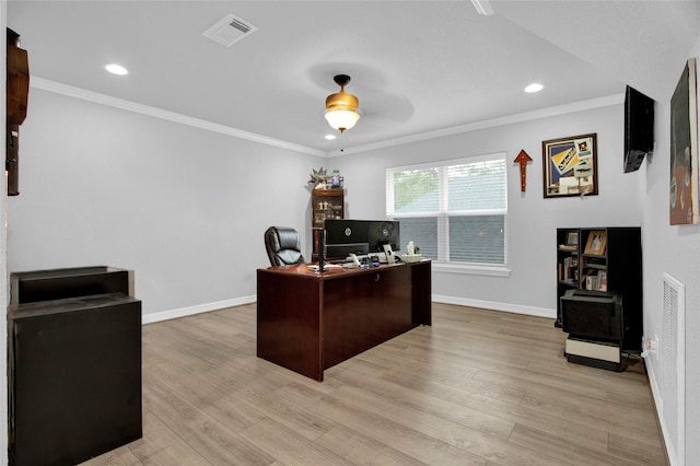 office area featuring ceiling fan, light wood-type flooring, and crown molding