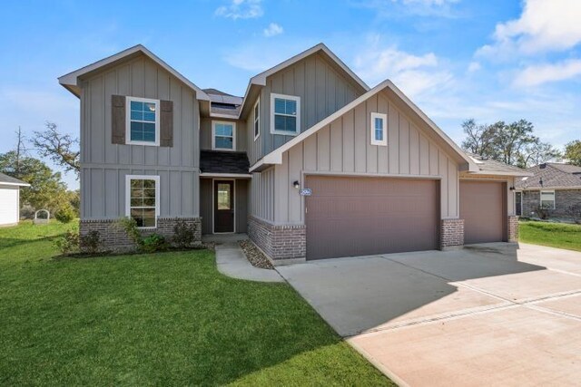 craftsman-style house with solar panels, a garage, and a front lawn