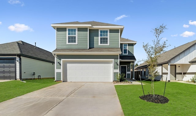 front of property with a garage and a front yard