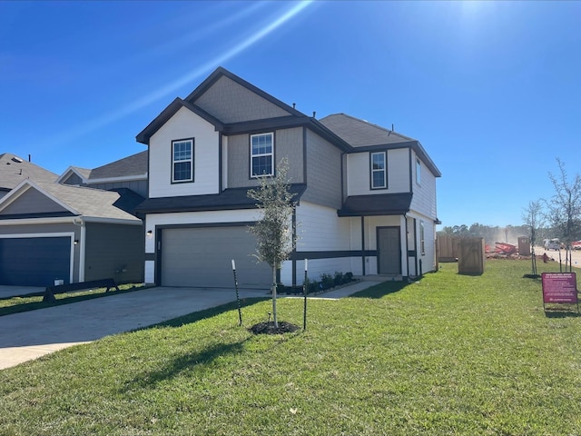 front of property with a garage and a front yard