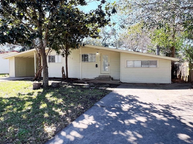 view of front of property with a carport