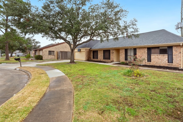 ranch-style house with a front yard