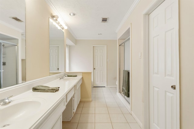 bathroom featuring walk in shower, ornamental molding, vanity, a textured ceiling, and tile patterned flooring