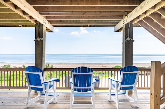 wooden terrace with a water view