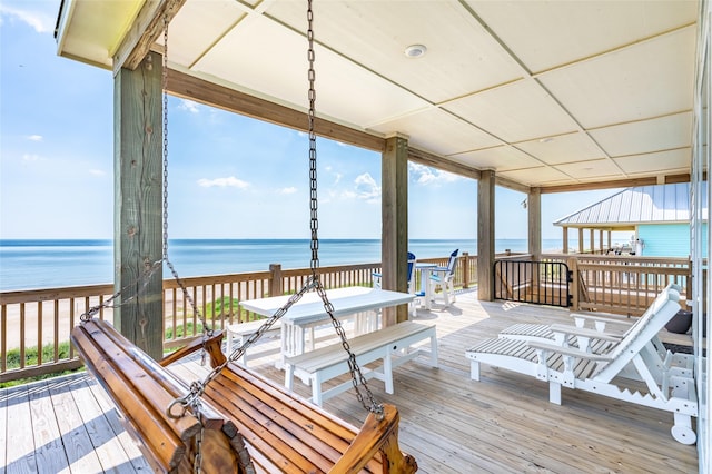 deck featuring a water view