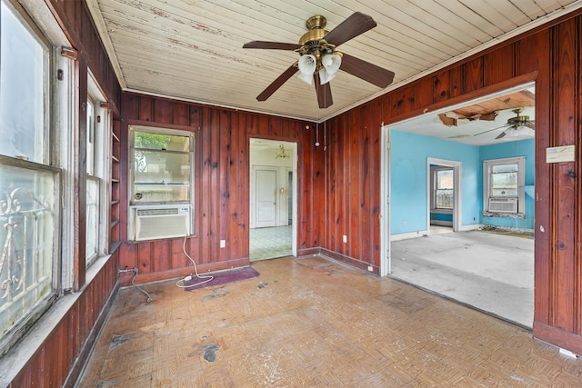 interior space featuring a wealth of natural light, cooling unit, and wood ceiling