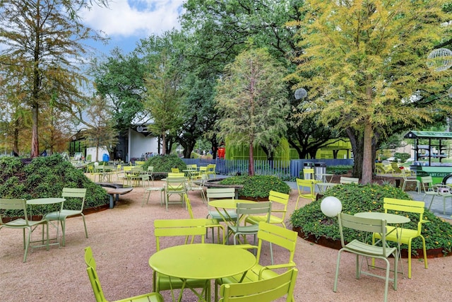 view of property's community featuring a patio area