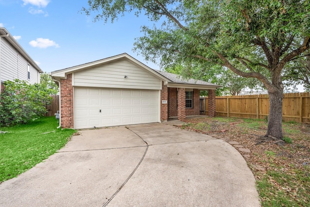 ranch-style home with a garage