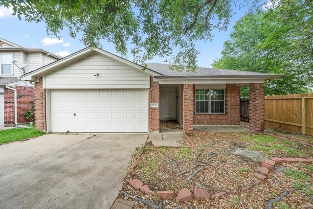 view of front of property featuring a garage