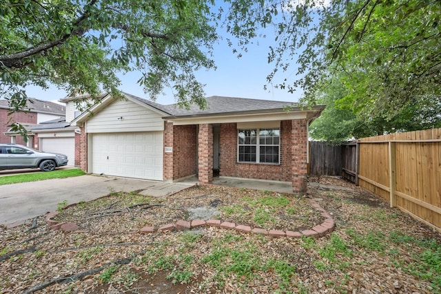 ranch-style house featuring a garage