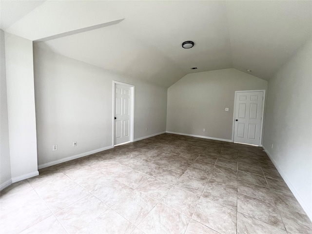 additional living space with lofted ceiling