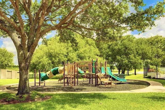 view of jungle gym with a yard