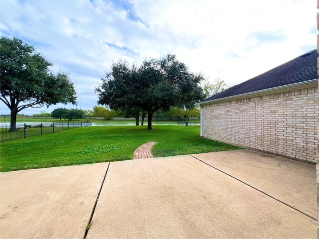 view of patio / terrace featuring a water view