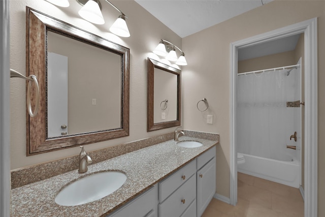 full bathroom featuring tile patterned floors, vanity, shower / bathtub combination with curtain, and toilet