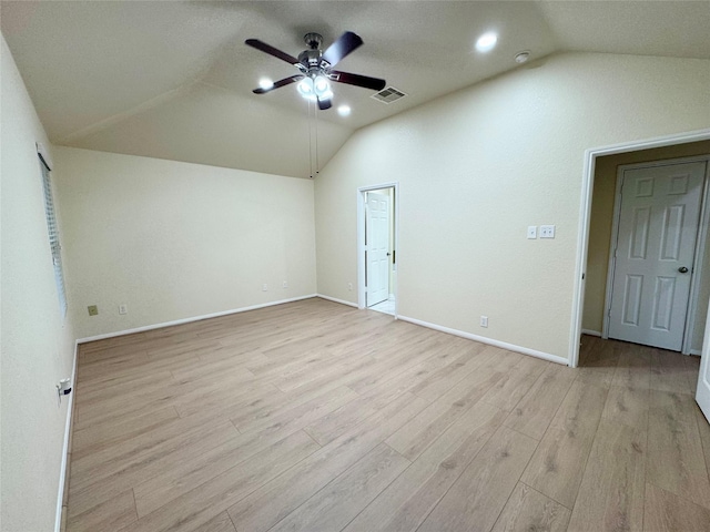 interior space with light hardwood / wood-style floors, ceiling fan, and lofted ceiling