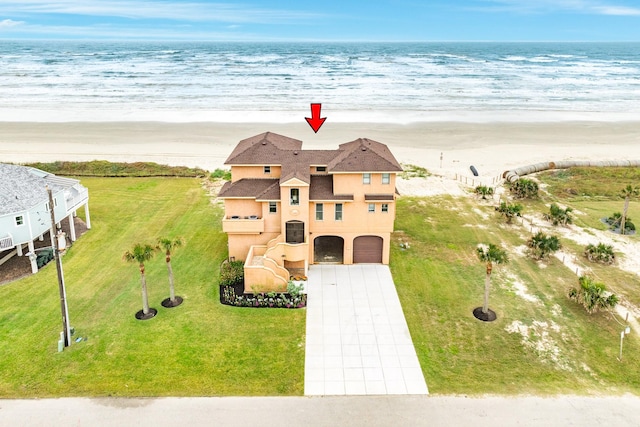 bird's eye view with a view of the beach and a water view